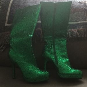 Glittery green knee high boots